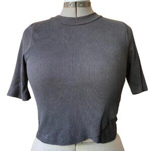 Cropped turtleneck asymmetrical hem quarter sleeve